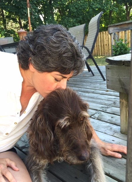 Janet kissing Gus on the deck July 2016